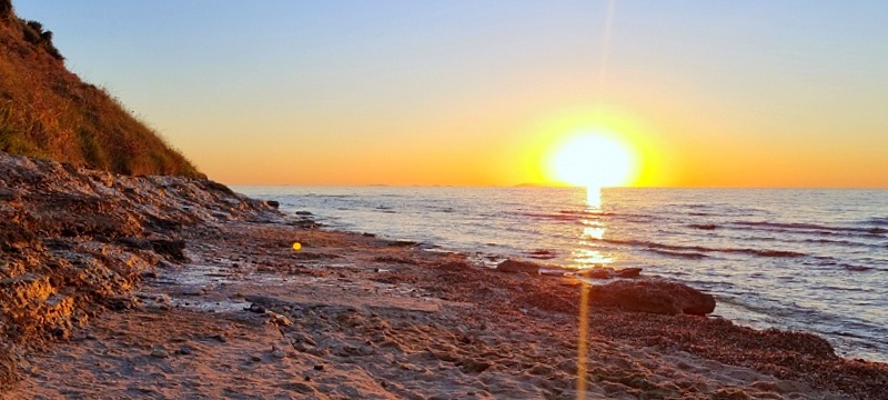 La Caccia - zachód słońca na plaży